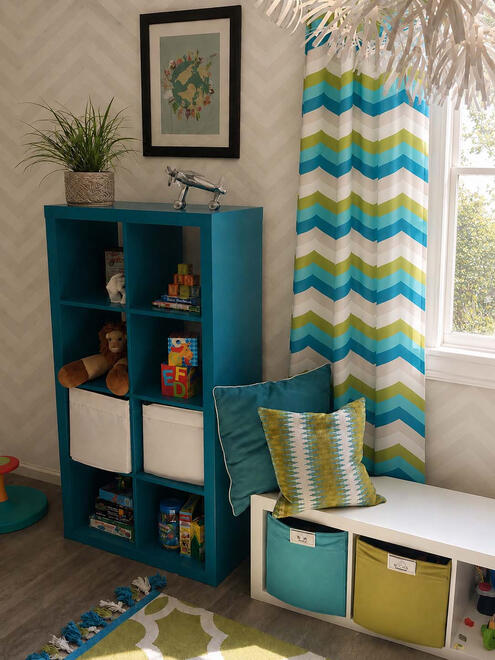 CURATED COLOR— This vibrant, youth-focused space embraces a graphic modern aesthetic through bold geometric patterns, repetition, and a carefully curated saturated color palette to create an inspiring environment.