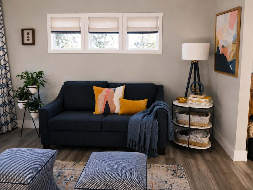 SUITE LIVING SPACE— Thoughtfully designed as a relaxed and inviting lounge, this space maximizes every element within a compact footprint. Flexible seating and carefully considered furnishings create a comfortable setting for everyday living.